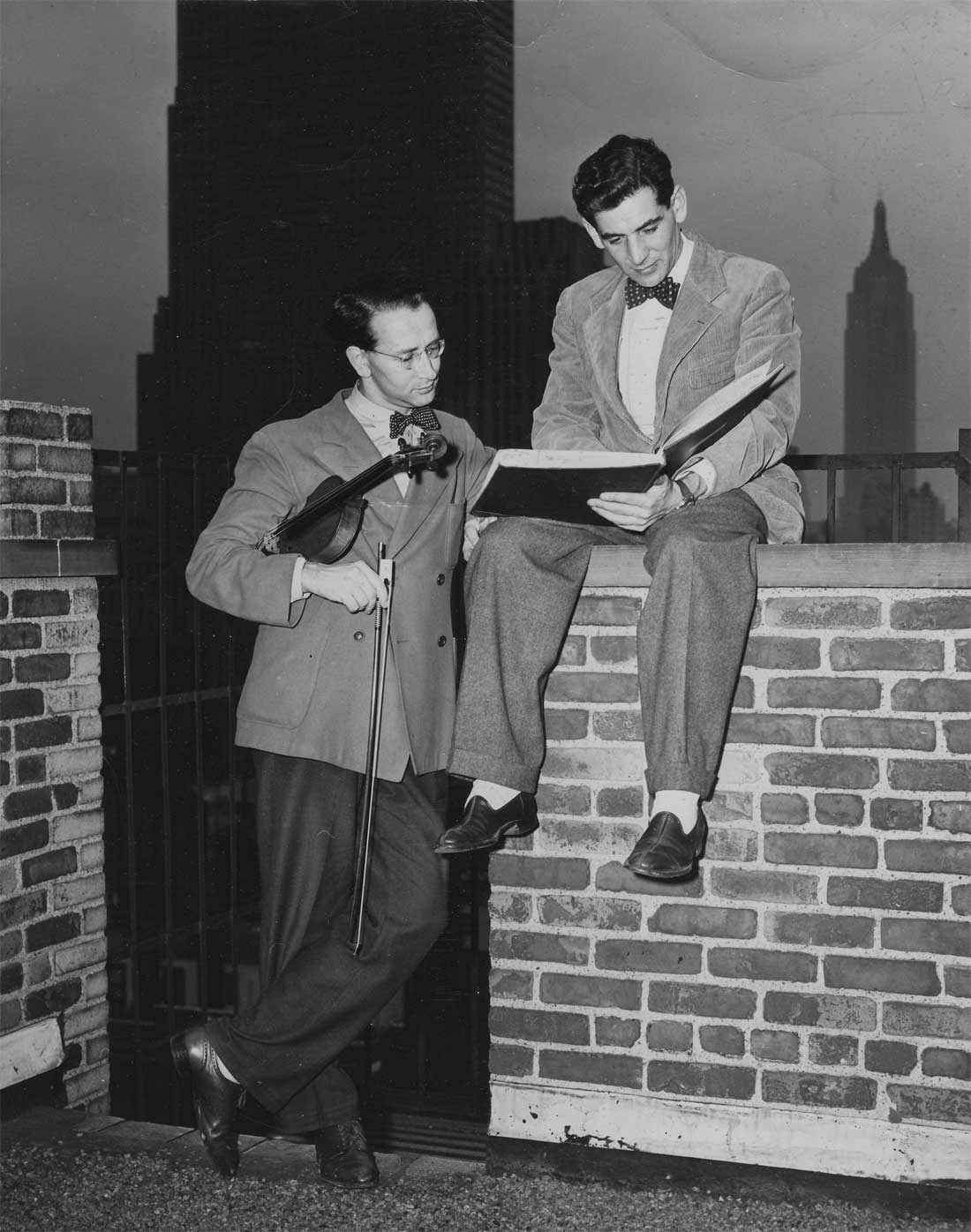 Werner Lywen and Leonard Bernstein discussing on City Center roof